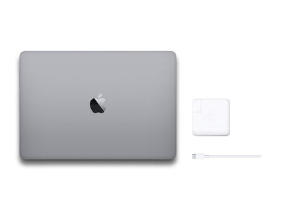 Macbook Pro 2019 Space Grey top closed with charger