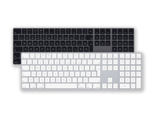 Apple Magic Keyboards in Black and white  French/Canadian Layout Top view on a white background